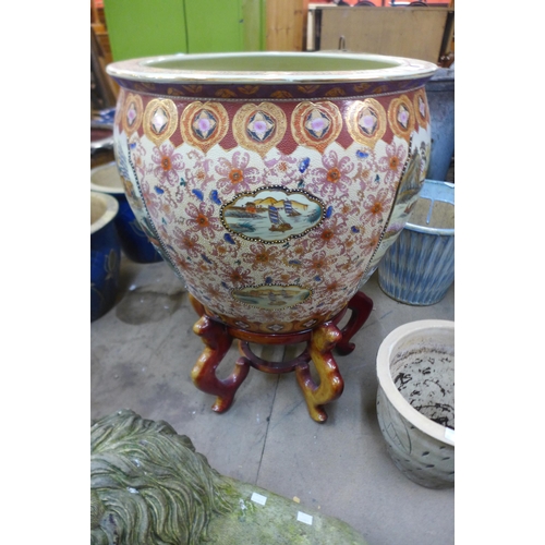 282 - A large Japanese satsuma porcelain fishbowl, on hardwood stand