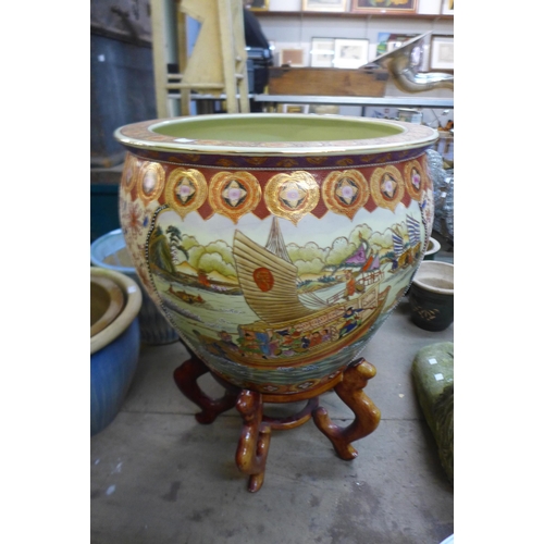 282 - A large Japanese satsuma porcelain fishbowl, on hardwood stand