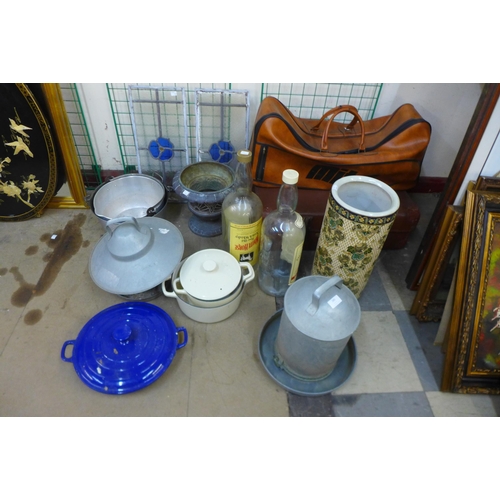 285 - A pair of stained glass window panes, metalware, cooking pots, stick stand, etc.