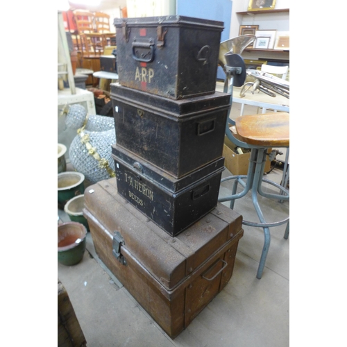 287 - Four assorted tin trunks