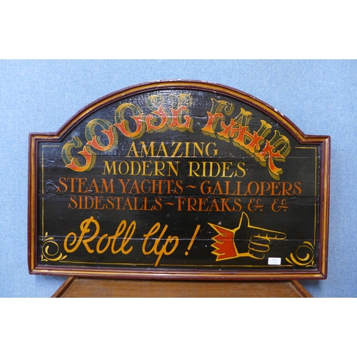 323 - A painted wooden Goose Fair sign