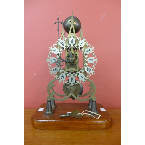 330 - A brass fusee skeleton clock