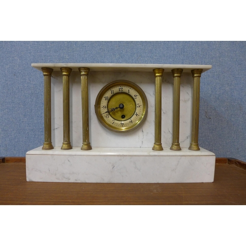 334 - A 19th Century French marble and brass architectural cased mantel clock