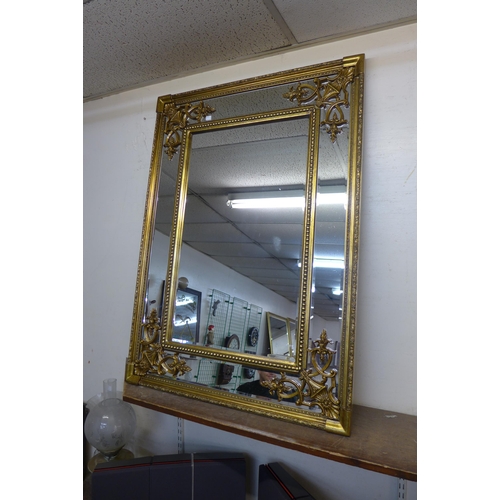 343A - A French style gilt framed mirror