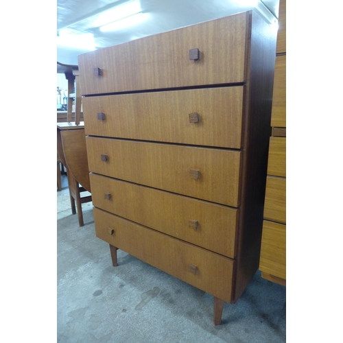 35 - A teak chest of drawers