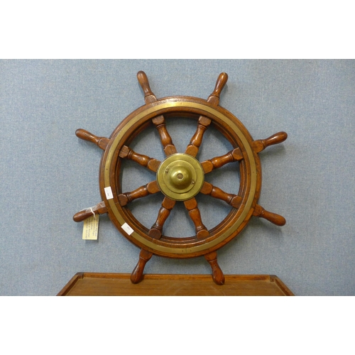 351 - An oak and brass ship's wheel from a Canadian Royal Navy gun-boat, salvaged 1945 in Argyllshire