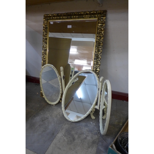 355 - A gilt framed mirror and a cream and parcel gilt dressing table mirror