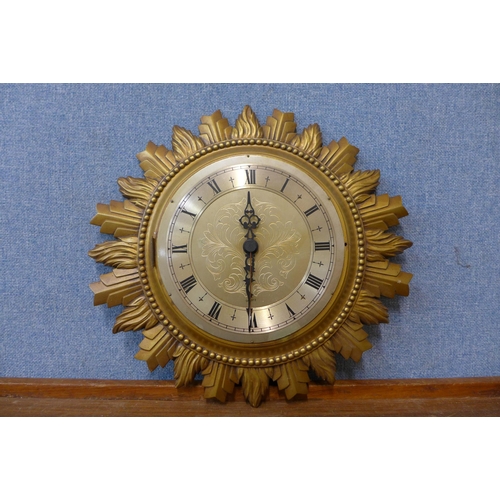 361 - A gilt sunburst wall clock