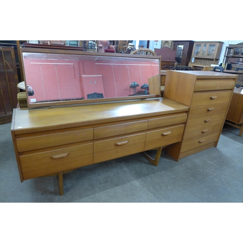 37 - A William Lawrence teak chest of drawers and dressing table