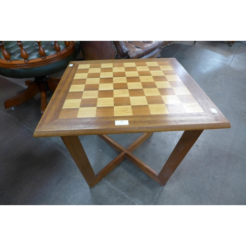 38 - A teak games/coffee table