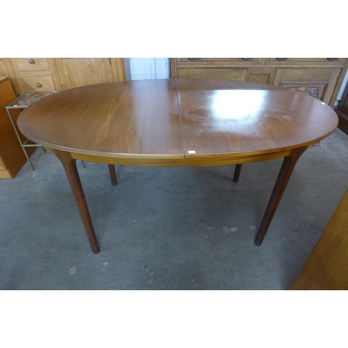 39A - A McIntosh teak oval extending dining table