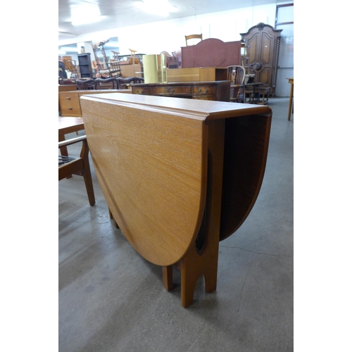 51 - A McIntosh teak drop leaf table