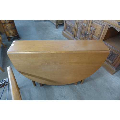 51 - A McIntosh teak drop leaf table