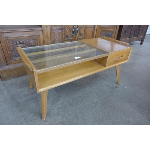 52 - A G-Plan Brandon light oak and glass topped coffee table