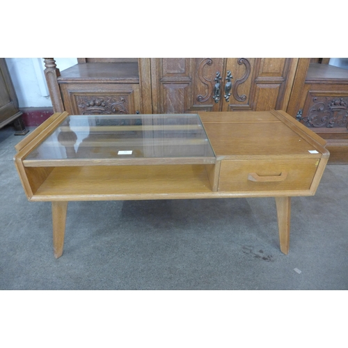 52 - A G-Plan Brandon light oak and glass topped coffee table