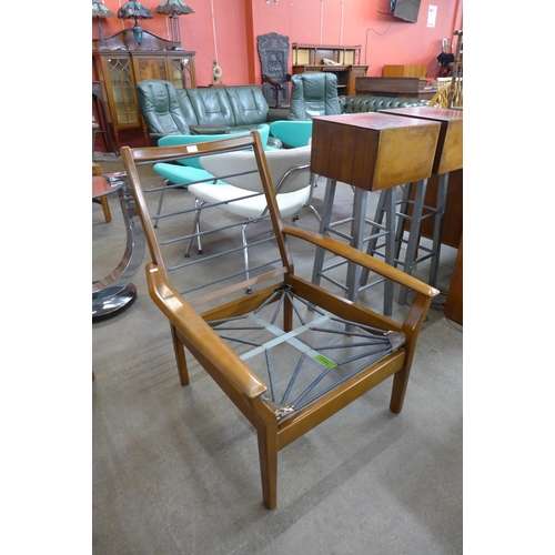 55 - A Cintique teak armchair frame