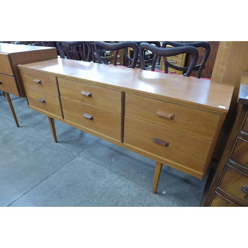 65 - A teak sideboard