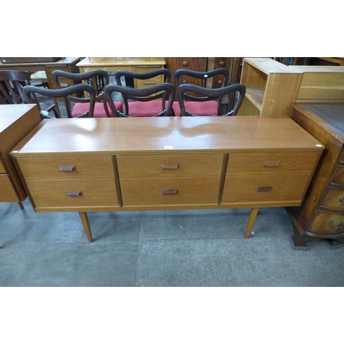 65 - A teak sideboard