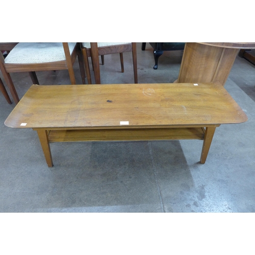 67 - A teak and bent plywood sleigh top coffee table