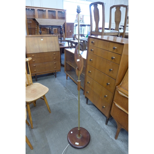 71 - A teak standard lamp