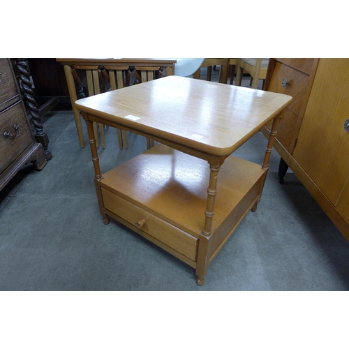 77 - A Nathan teak side table