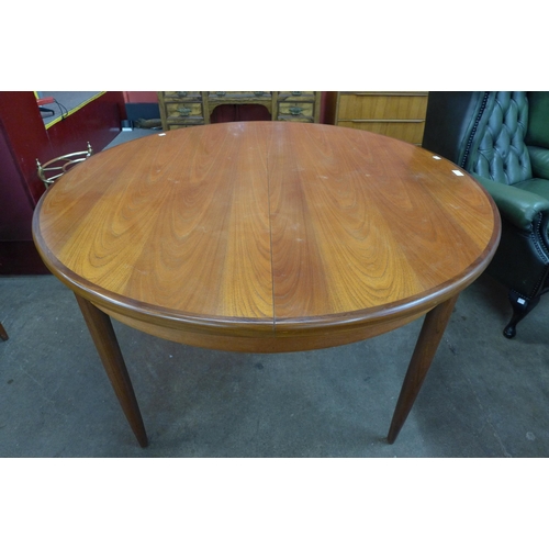 8 - A G-Plan Fresco teak circular extending dining table