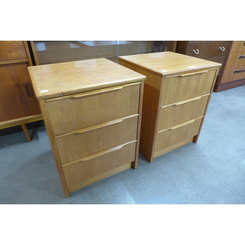 81 - A pair of teak bedside chests