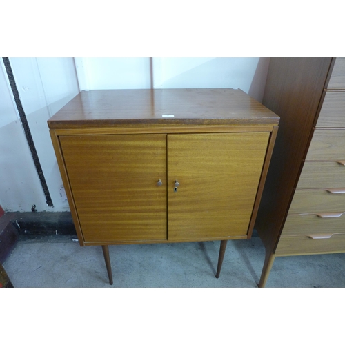 83 - A teak two door cabinet