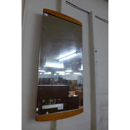 86 - A teak framed mirror