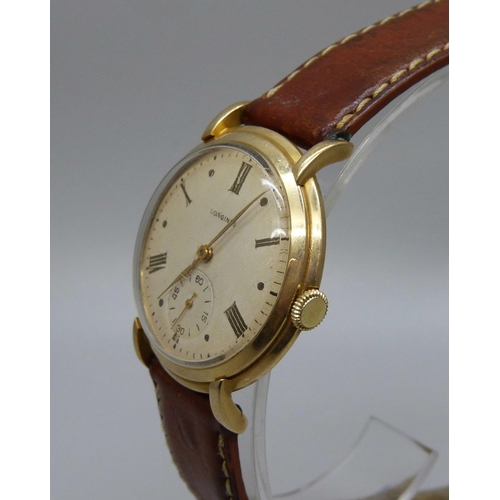 1007 - A 9ct gold Longines wristwatch, 34mm case