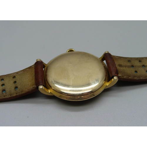 1007 - A 9ct gold Longines wristwatch, 34mm case