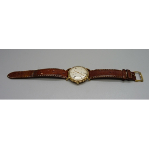 1007 - A 9ct gold Longines wristwatch, 34mm case