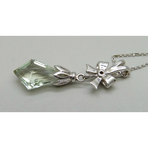 1034 - A 9ct white gold, green amethyst and diamond pendant, 5.7g