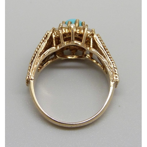 1041 - A 9ct gold, turquoise colour cabochon and seed pearl ring, 4.6g, O