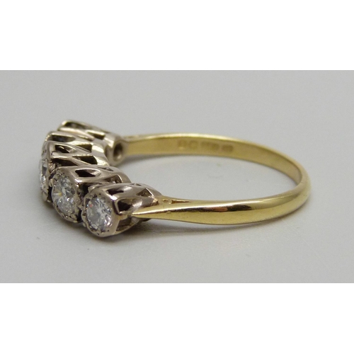 1055 - An 18ct gold, five stone diamond ring, 0.75ct diamond weight, 4g, R