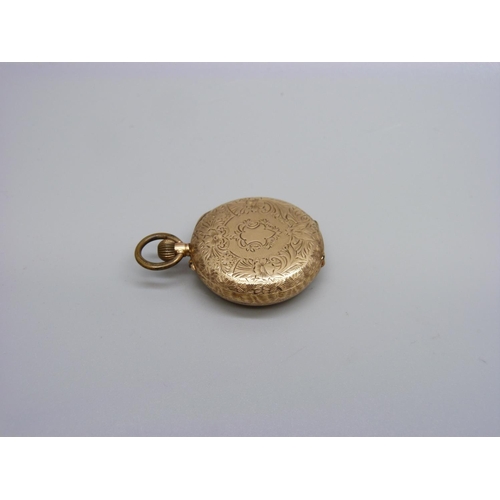 1074 - A 14ct gold lady's fob watch, 29mm case