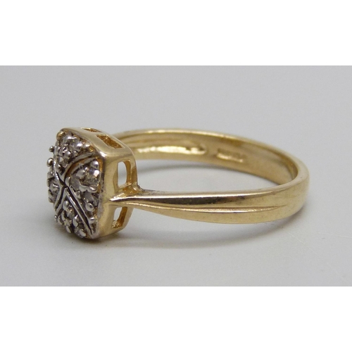 1079 - A 9ct gold and diamond ring, 2.8g, O