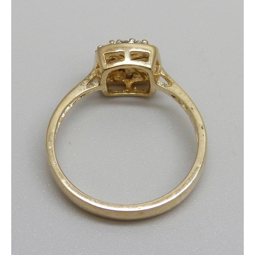 1079 - A 9ct gold and diamond ring, 2.8g, O