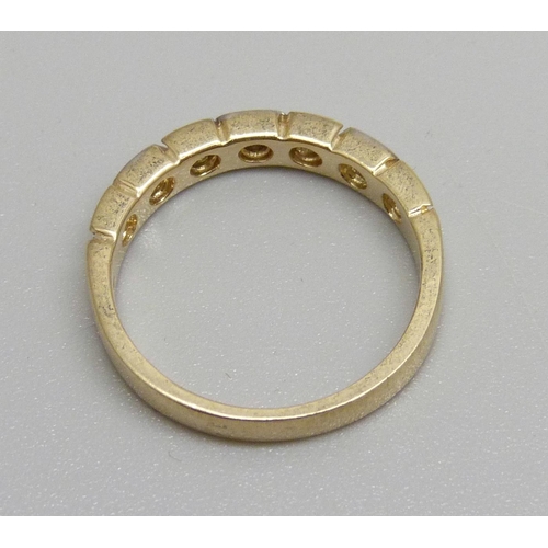 1097 - A 9ct gold and diamond half eternity ring, 2.6g, M