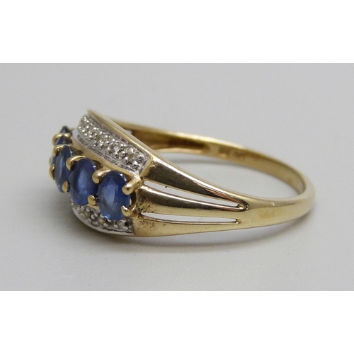 1146 - A 9ct gold, five sapphire and fourteen diamond ring, 2.5g, S