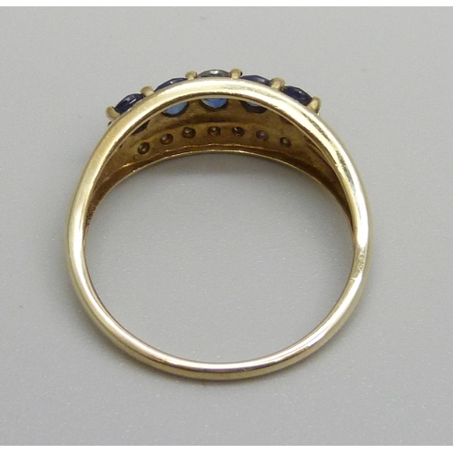 1146 - A 9ct gold, five sapphire and fourteen diamond ring, 2.5g, S