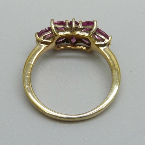 1148 - A silver gilt and pink stone cluster, S