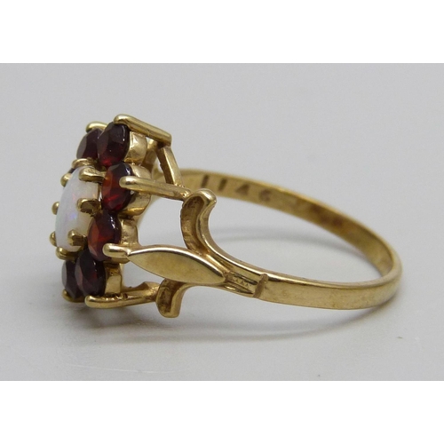 1149 - A 9ct gold, opal and garnet cluster ring, 2.5g, O