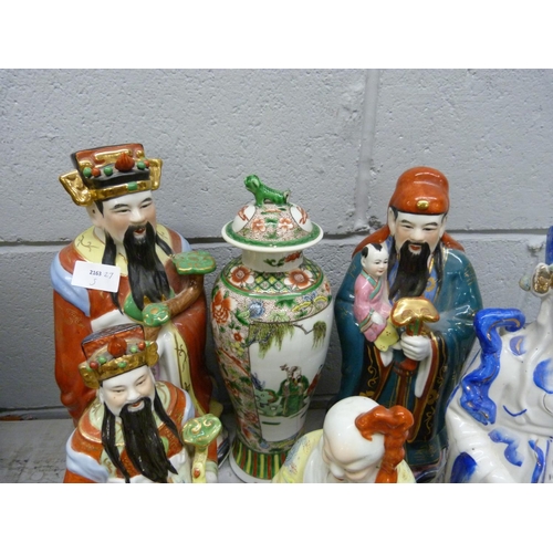 1187 - A collection of oriental figures and vases and a Flying Scotsman egg **PLEASE NOTE THIS LOT IS NOT E... 