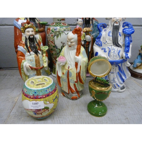 1187 - A collection of oriental figures and vases and a Flying Scotsman egg **PLEASE NOTE THIS LOT IS NOT E... 