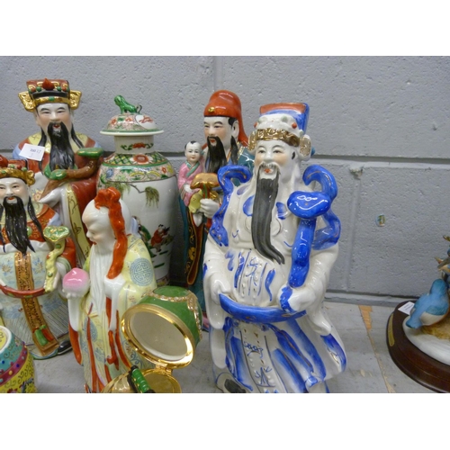 1187 - A collection of oriental figures and vases and a Flying Scotsman egg **PLEASE NOTE THIS LOT IS NOT E... 