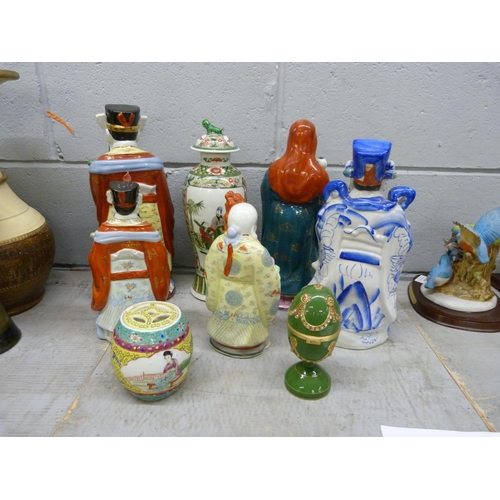 1187 - A collection of oriental figures and vases and a Flying Scotsman egg **PLEASE NOTE THIS LOT IS NOT E... 