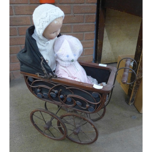 1219 - A child's small wooden pram with two mid-20th Century dolls **PLEASE NOTE THIS LOT IS NOT ELIGIBLE F... 