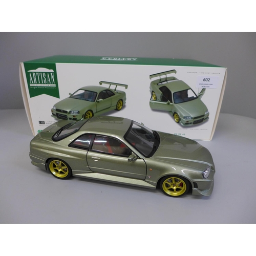 602 - An Artisan Collection 1999 Nissan Skyline GT-R R34 model vehicle, boxed