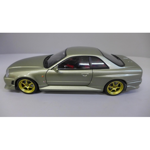 602 - An Artisan Collection 1999 Nissan Skyline GT-R R34 model vehicle, boxed